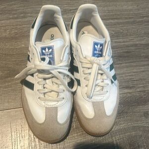 Gently used adidas sambas.  There is a mark inside from removing a name label.
